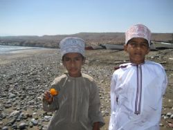 Omani boys at an Omani fishing village. by Ben Nichols 